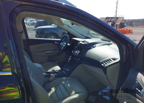 2016 Ford Escape Titanium z USA, uszkodzony, nr VIN 1FMCU0JX6GUC64657